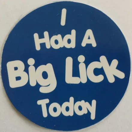 Round blue sticker that reads I Had A Big Lick Today